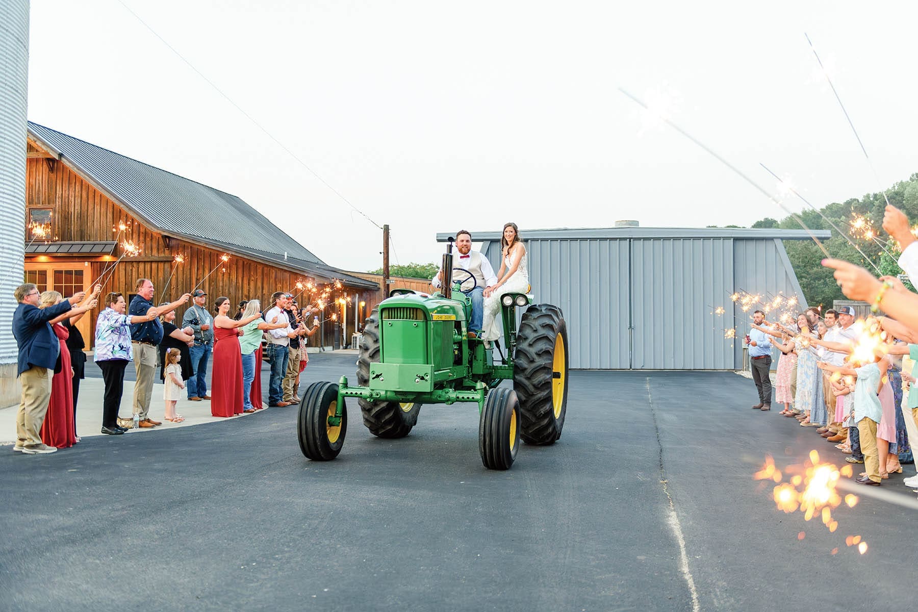 couple on john deer tractor